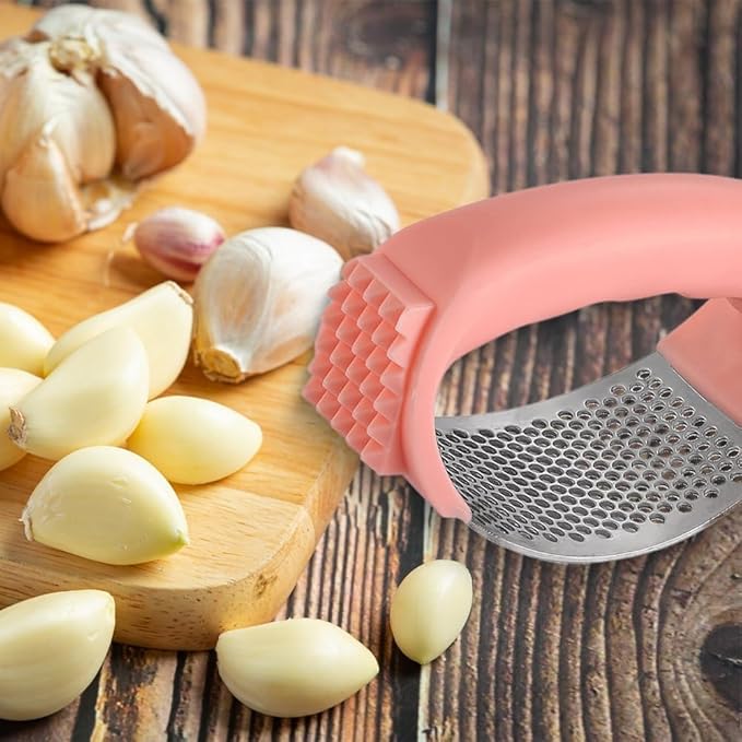 Garlic Press Rocker Stainless Steel, Garlic Crusher with Peeler & Cleaning Brush, Easy to Use Garlic Mincer for Kitchen Cooking, Ergonomic Garlic Chopper Tool, Durable Garlic Presser Gadget (Pink)