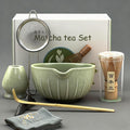 Matcha Bowl and Tea Whisk Set, 7-Piece Collection: 19-ounce ceramic bowl, whisk stand, bamboo scoop with scoop holder, tea strainer, and tea towel. Complete matcha ceremony set.